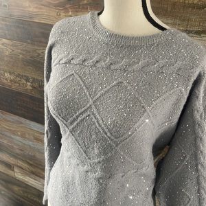 Design history sparkly sweater